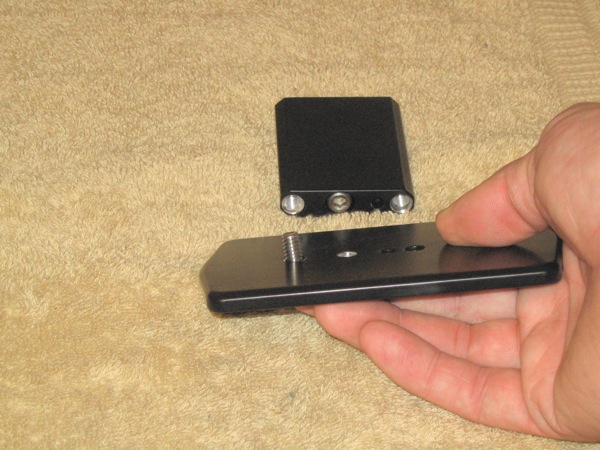 Insert short screws into base.  Be sure that the threaded hole in the base plate lines up with long screw hole.