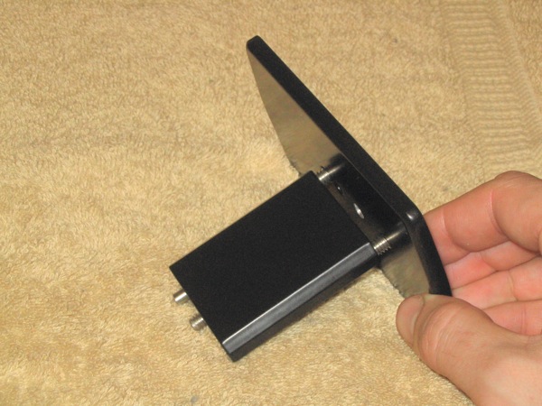 Thread short screws into vertical plate